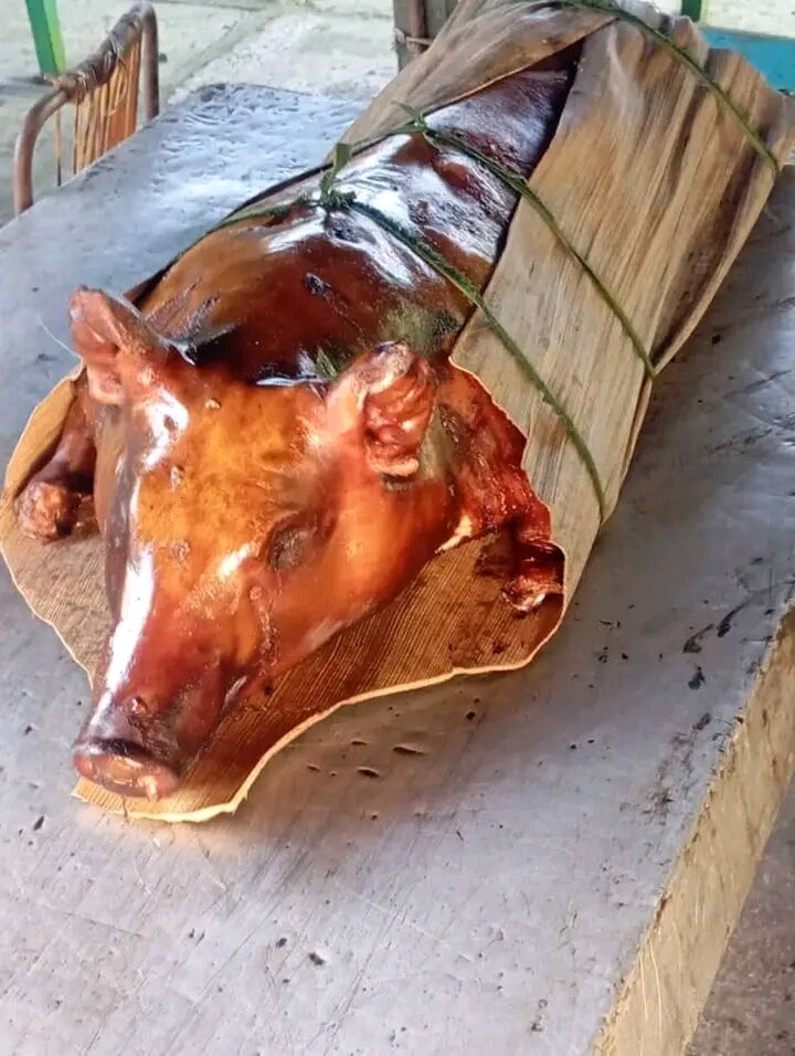 Portada de Cerdo asado y comida criolla para 70 comensales