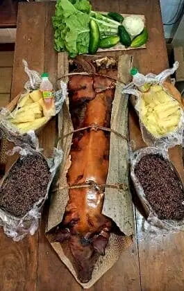 Portada de Cerdo asado entero para 80 comensales con guarniciones